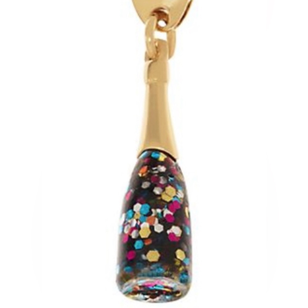 Kate Spade champagne glitter charm
